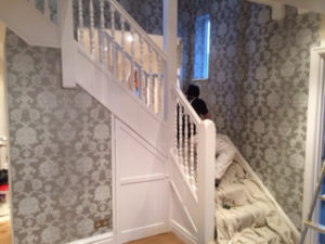 New wall paper by stairs projects