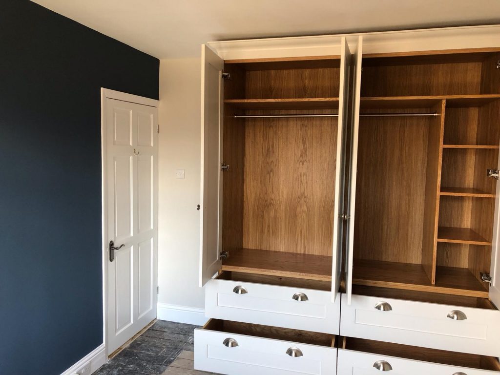 Feature wall and inside of wardrobe after makeover completed